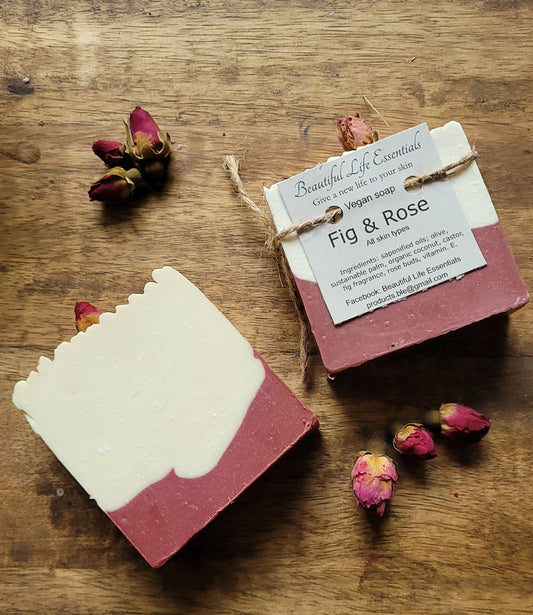 Handmade vegan soap with olive oil, coconut oil, and castor oil, infused with fig and rose fragrance. Features real rose petals from our family garden for a soothing, natural bath experience.